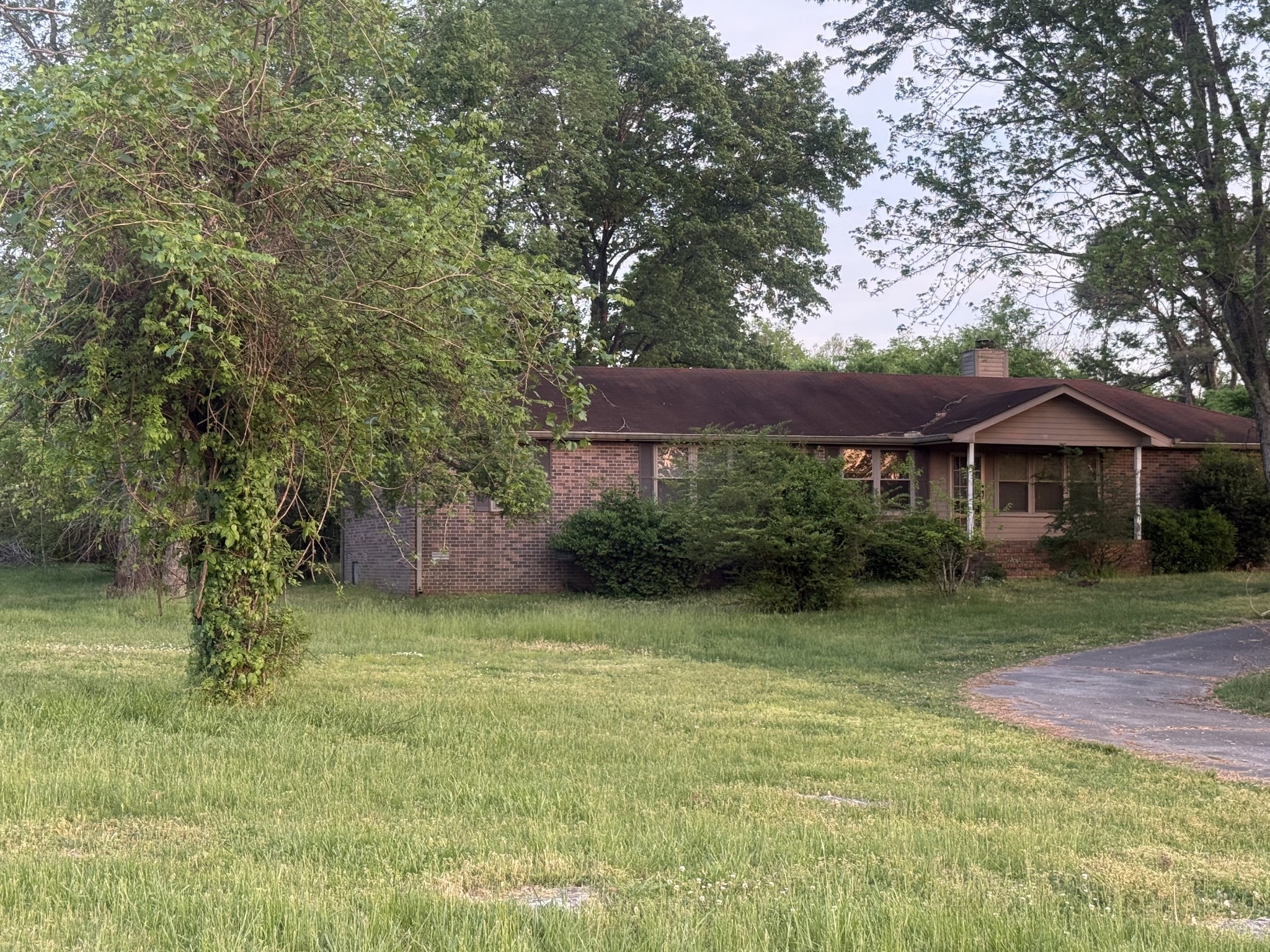 191 Cooks Rd Extension Lebanon, TN 37087 - Photo 22 of 33 a front view of a house with a yard