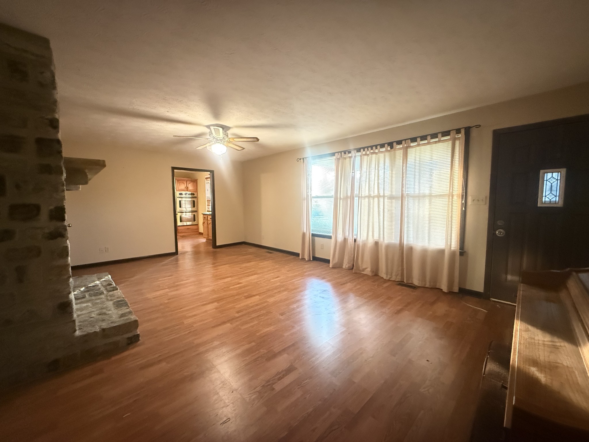 191 Cooks Rd Extension Lebanon, TN 37087 - Photo 9 of 33 a view of an empty room with wooden floor and a window