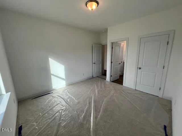 a view of an empty room and window