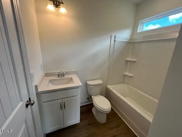 a view of a livingroom with an empty space and a window