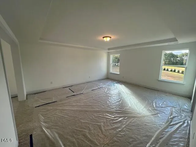 a view of empty room with windows