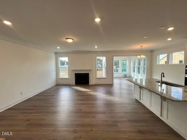 a view of a hallway with a chandelier