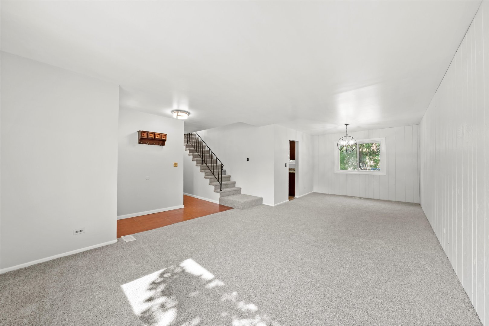 56 Oakhurst Road Matteson, IL 60443 - Photo 4 of 18 a view of an empty room and a window