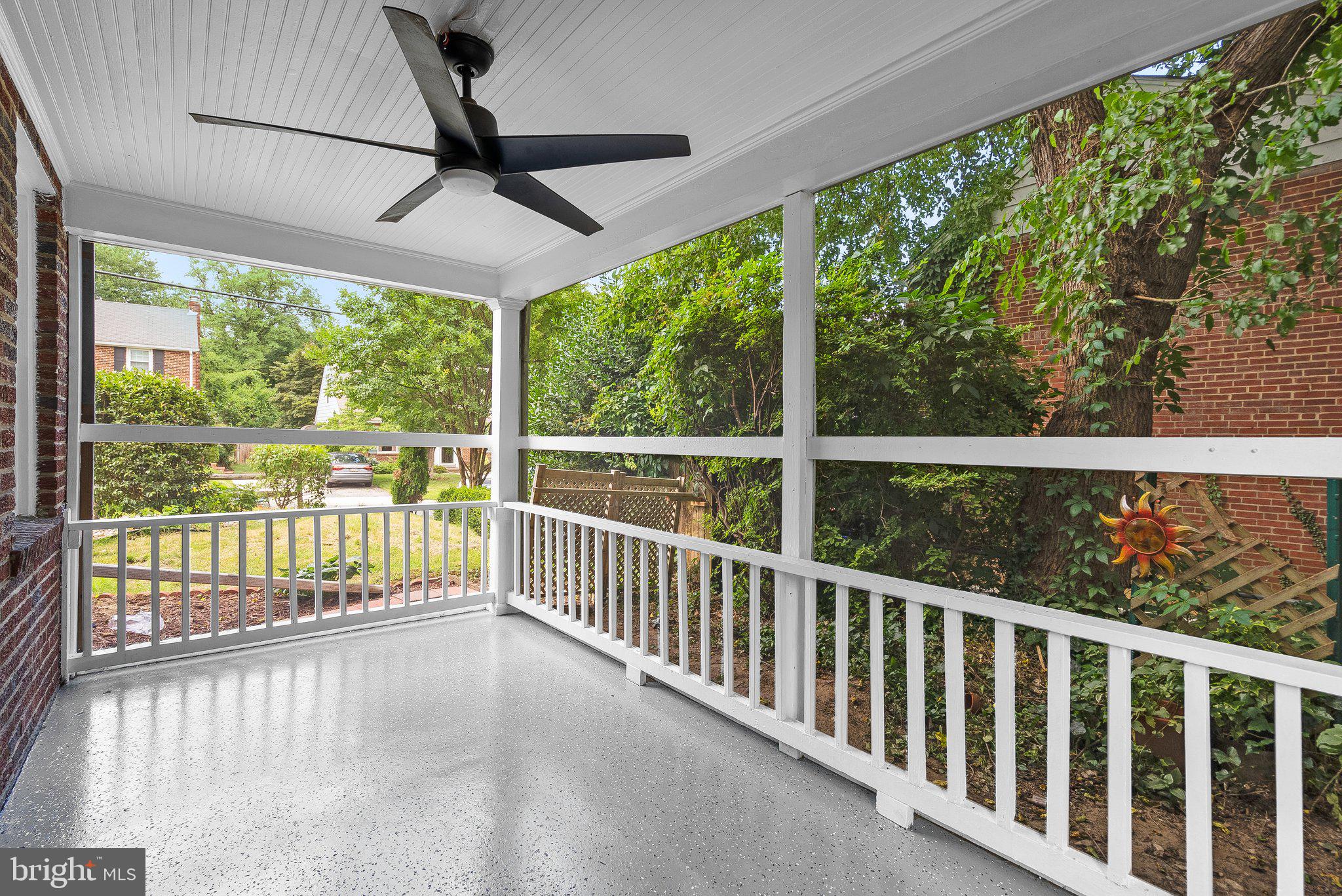 208 Granville Drive Silver Spring, MD 20901 - Photo 12 of 38 Side porch fully screened in with ceiling fan