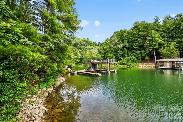 a view of a lake with houses in ocean