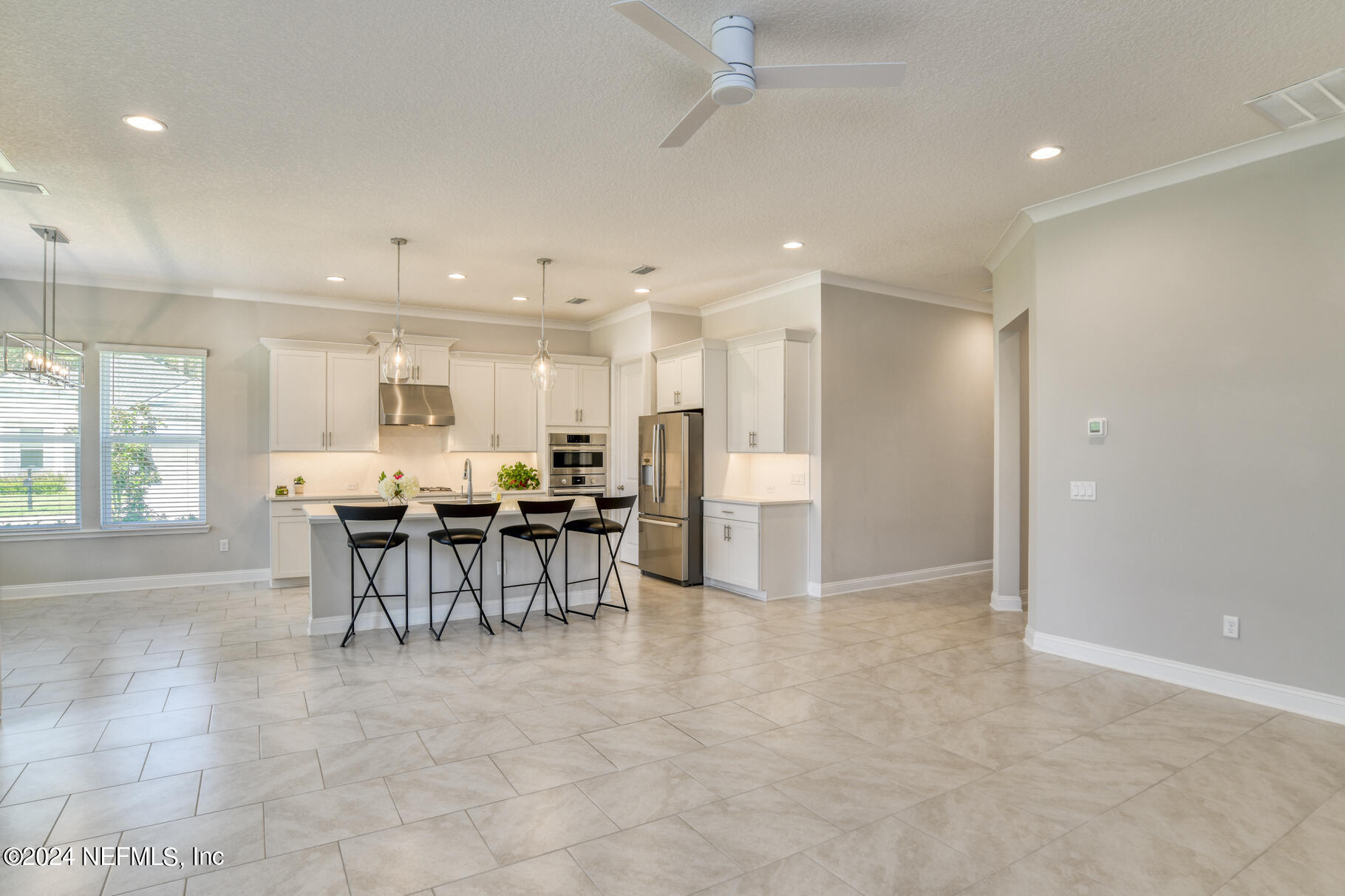 405 Pintoresco Drive St. Augustine, FL 32095 - Photo 17 of 51 a view of a kitchen and dining room
