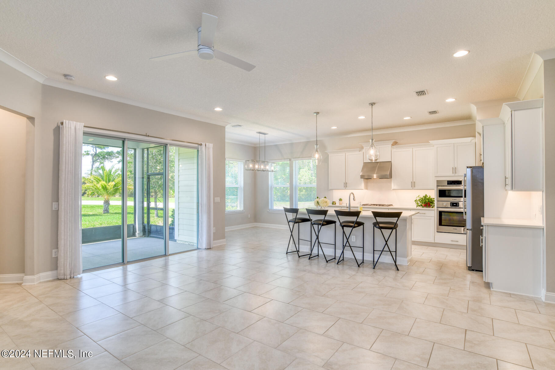 405 Pintoresco Drive St. Augustine, FL 32095 - Photo 21 of 51 a view of a dining area with furniture