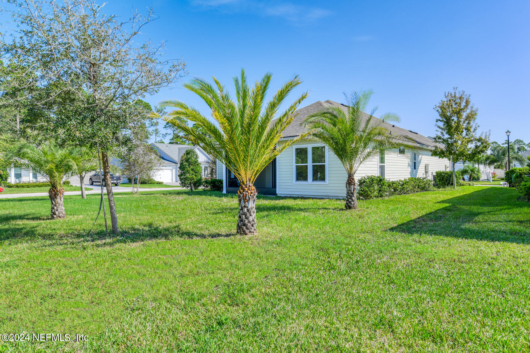 405 Pintoresco Drive St. Augustine, FL 32095 - Photo 28 of 51 a view of a house with a backyard