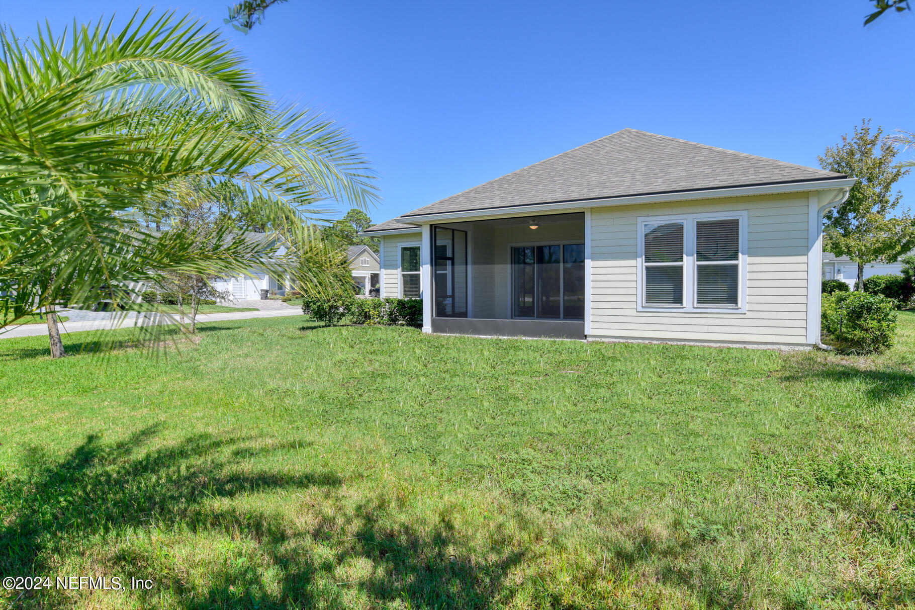 405 Pintoresco Drive St. Augustine, FL 32095 - Photo 29 of 51 a front view of a house with a yard