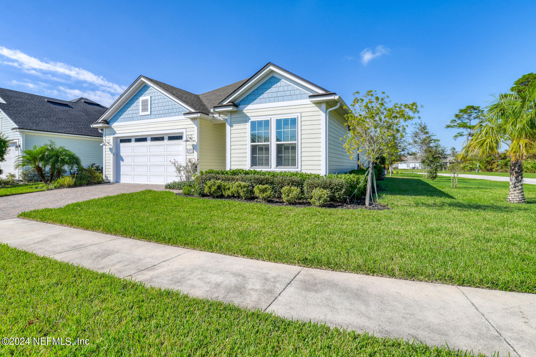 405 Pintoresco Drive St. Augustine, FL 32095 - Photo 3 of 51 a view of a house with a big yard and potted plants