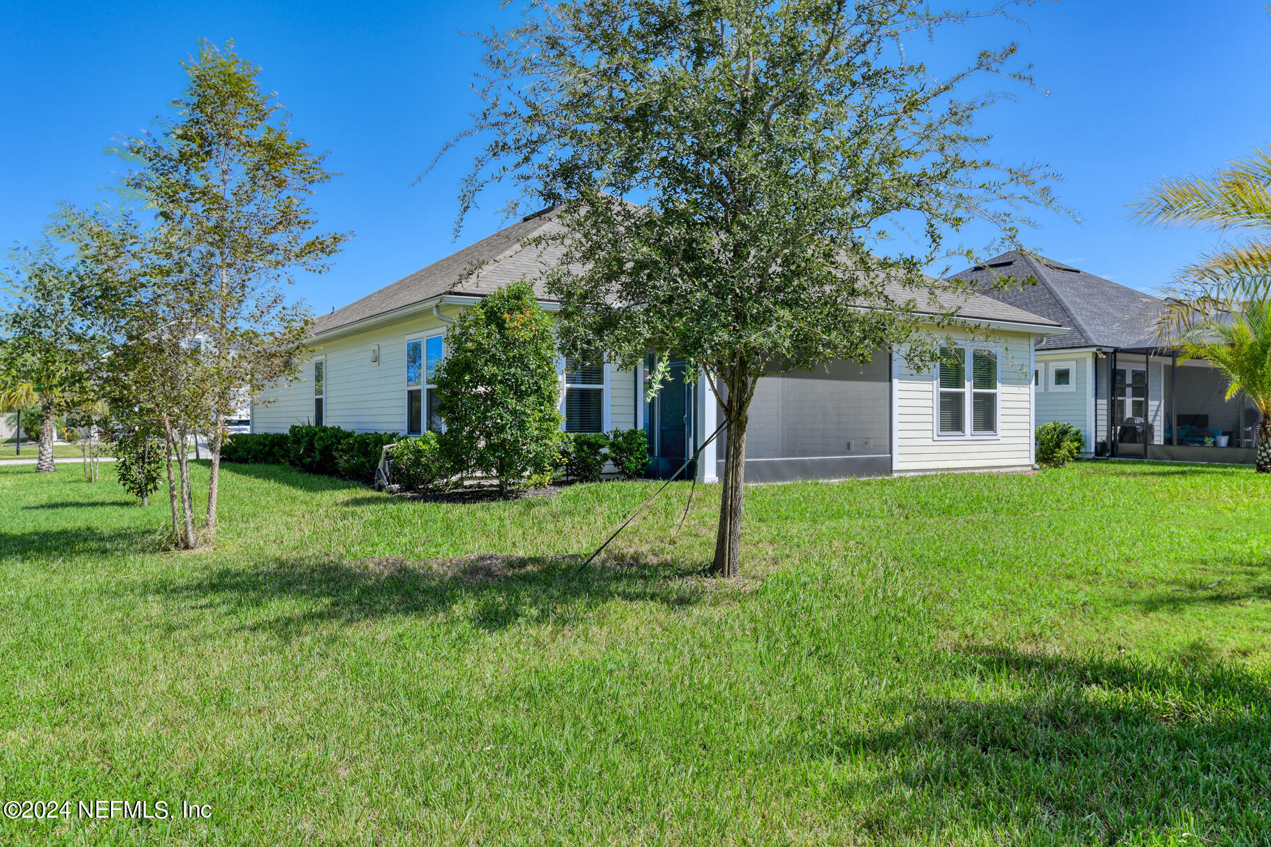 405 Pintoresco Drive St. Augustine, FL 32095 - Photo 31 of 51 a view of a house with a backyard