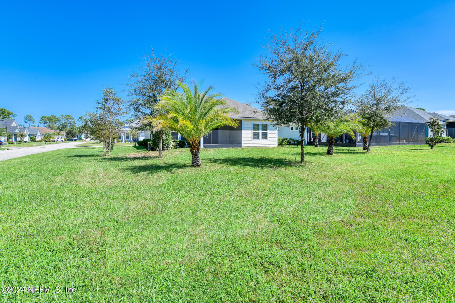 405 Pintoresco Drive St. Augustine, FL 32095 - Photo 5 of 51 a view of a house with a yard