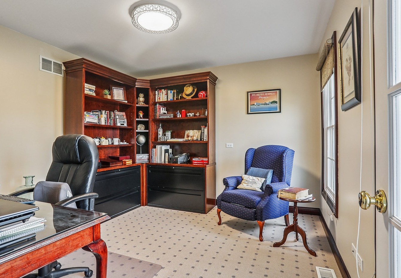 385 Coventry Lane Crete, IL 60417 - Photo 19 of 24 a work room with furniture and a book shelf