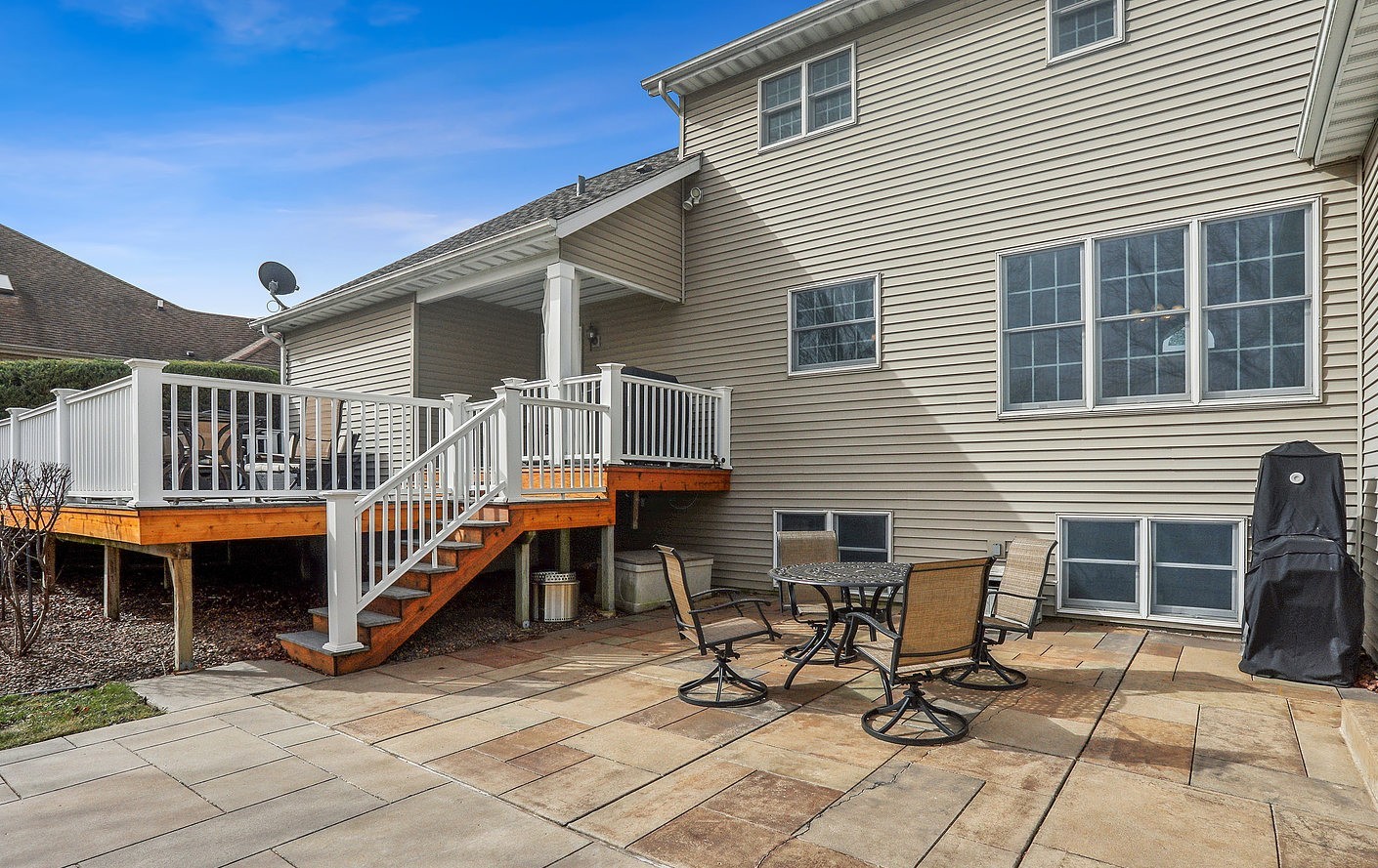 385 Coventry Lane Crete, IL 60417 - Photo 22 of 24 a view of a house with wooden deck and furniture