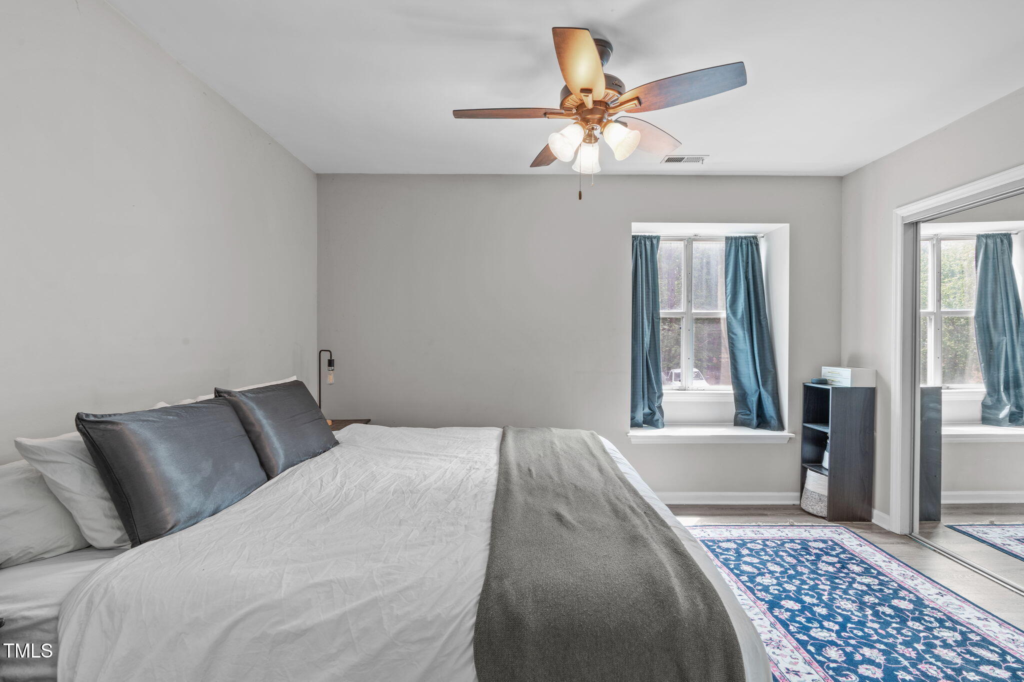 405 Gooseneck Drive, Unit B6 Cary, NC 27513 - Photo 13 of 26 a bedroom with a bed and window