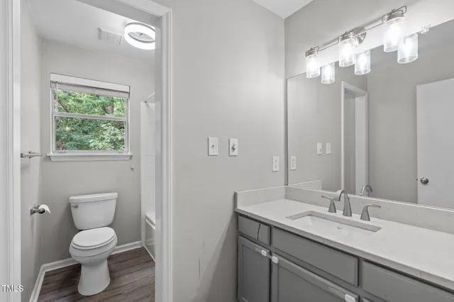 a view of a hallway view with staircase