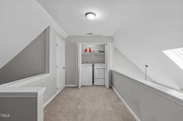 a view of balcony with wooden floor and outdoor seating