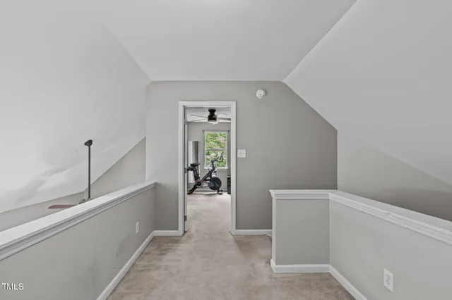 a view of a wooden chairs on the deck