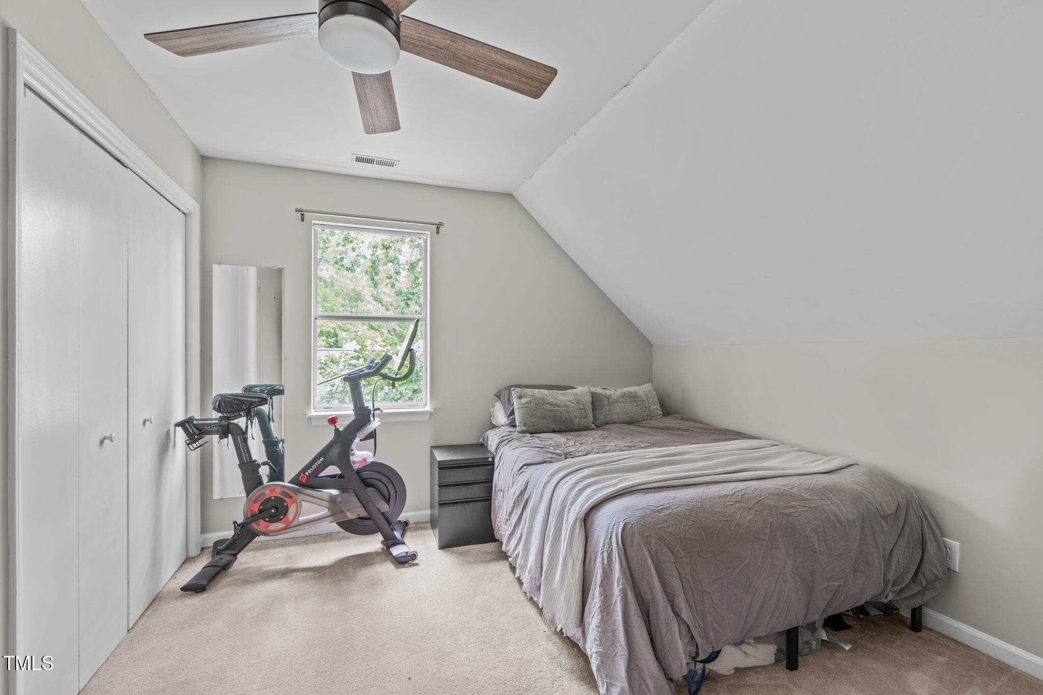 405 Gooseneck Drive, Unit B6 Cary, NC 27513 - Photo 21 of 26 a bedroom with a bed and a table