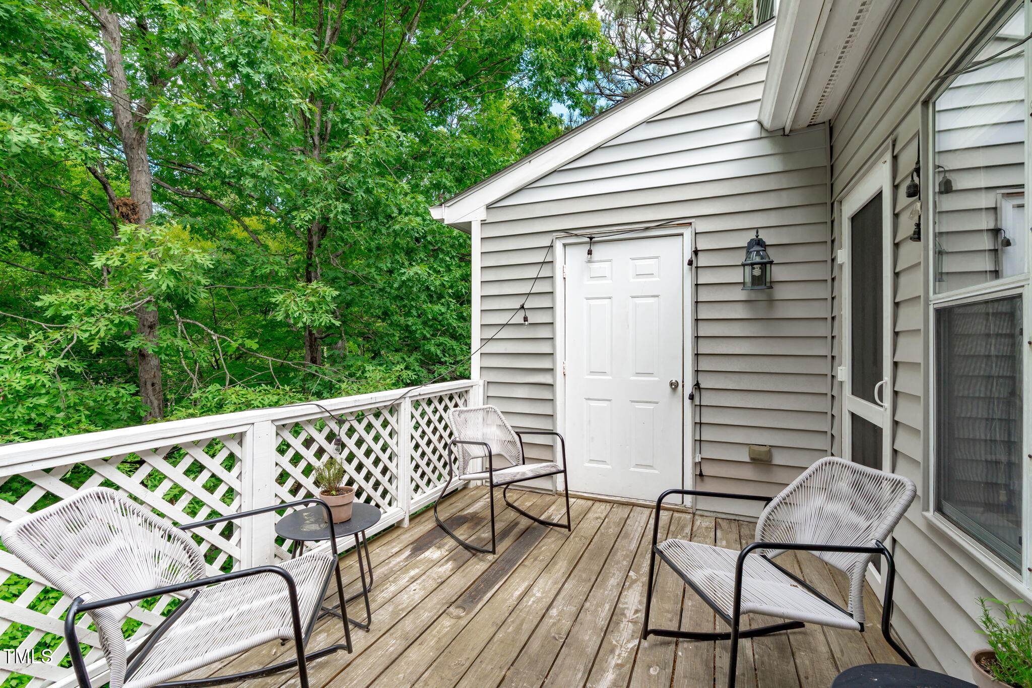 405 Gooseneck Drive, Unit B6 Cary, NC 27513 - Photo 23 of 26 a view of a wooden chairs on the deck