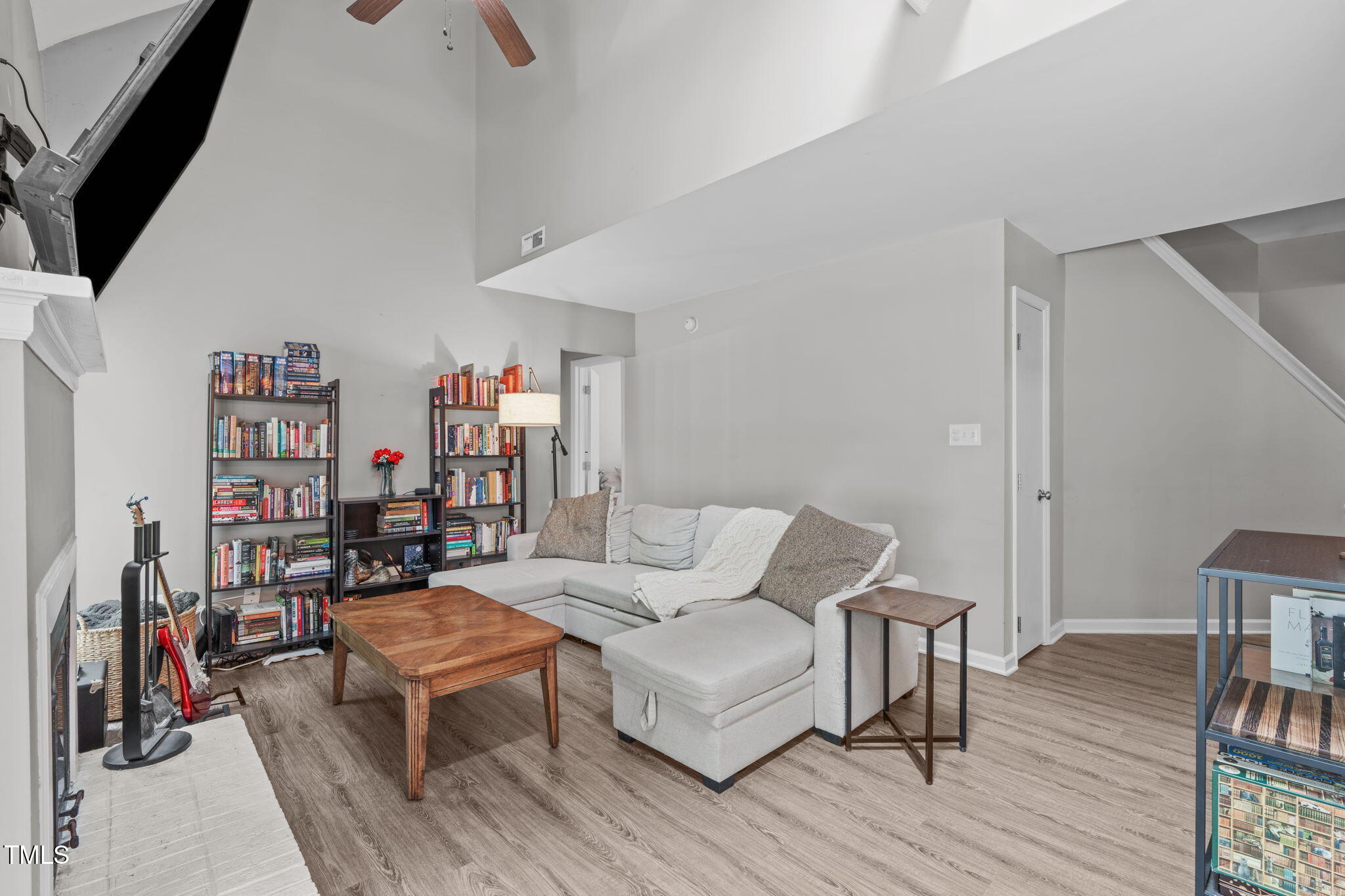 405 Gooseneck Drive, Unit B6 Cary, NC 27513 - Photo 7 of 26 a living room with furniture and a wooden floor