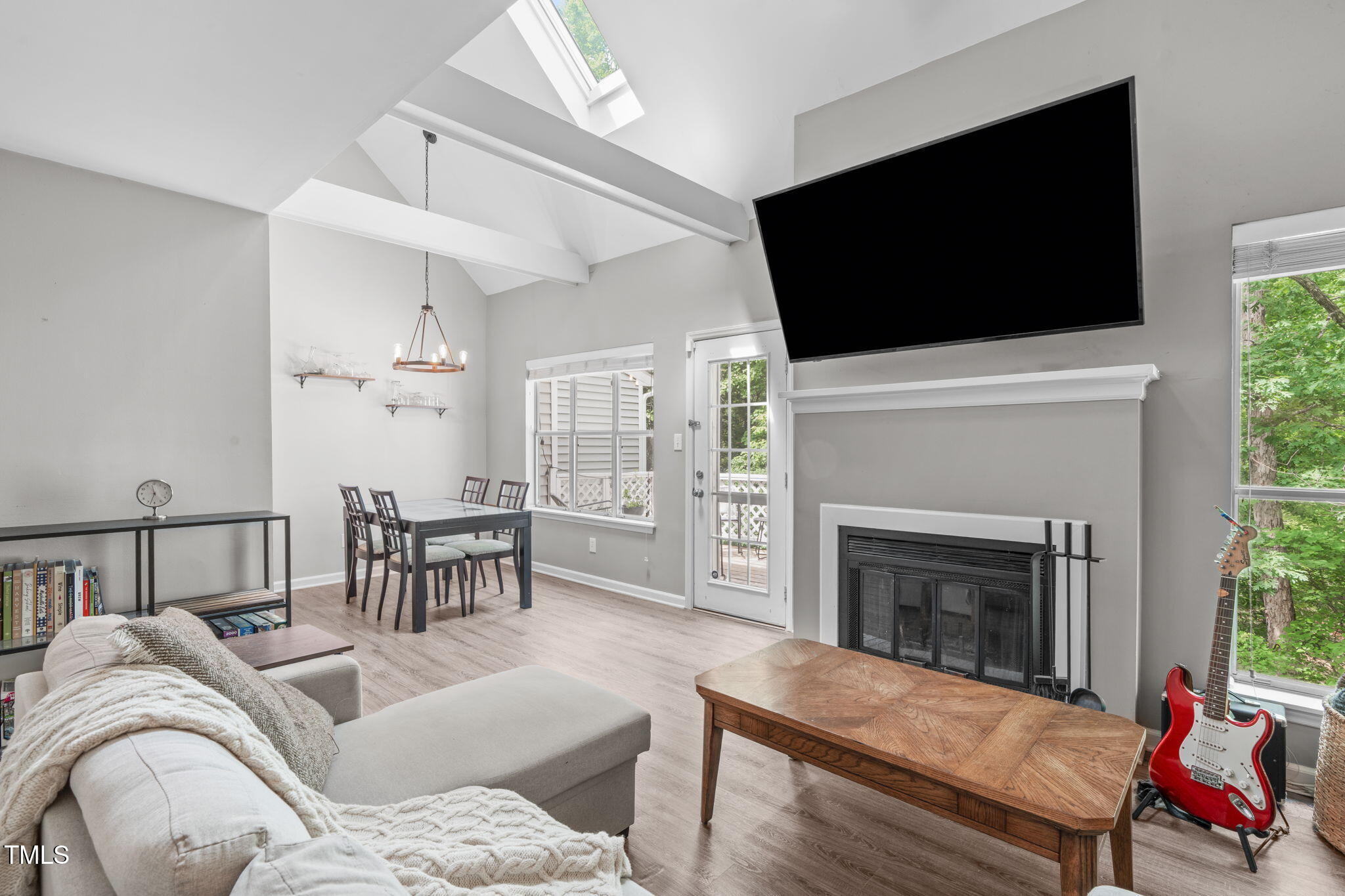 405 Gooseneck Drive, Unit B6 Cary, NC 27513 - Photo 8 of 26 a living room with furniture fireplace and flat screen tv