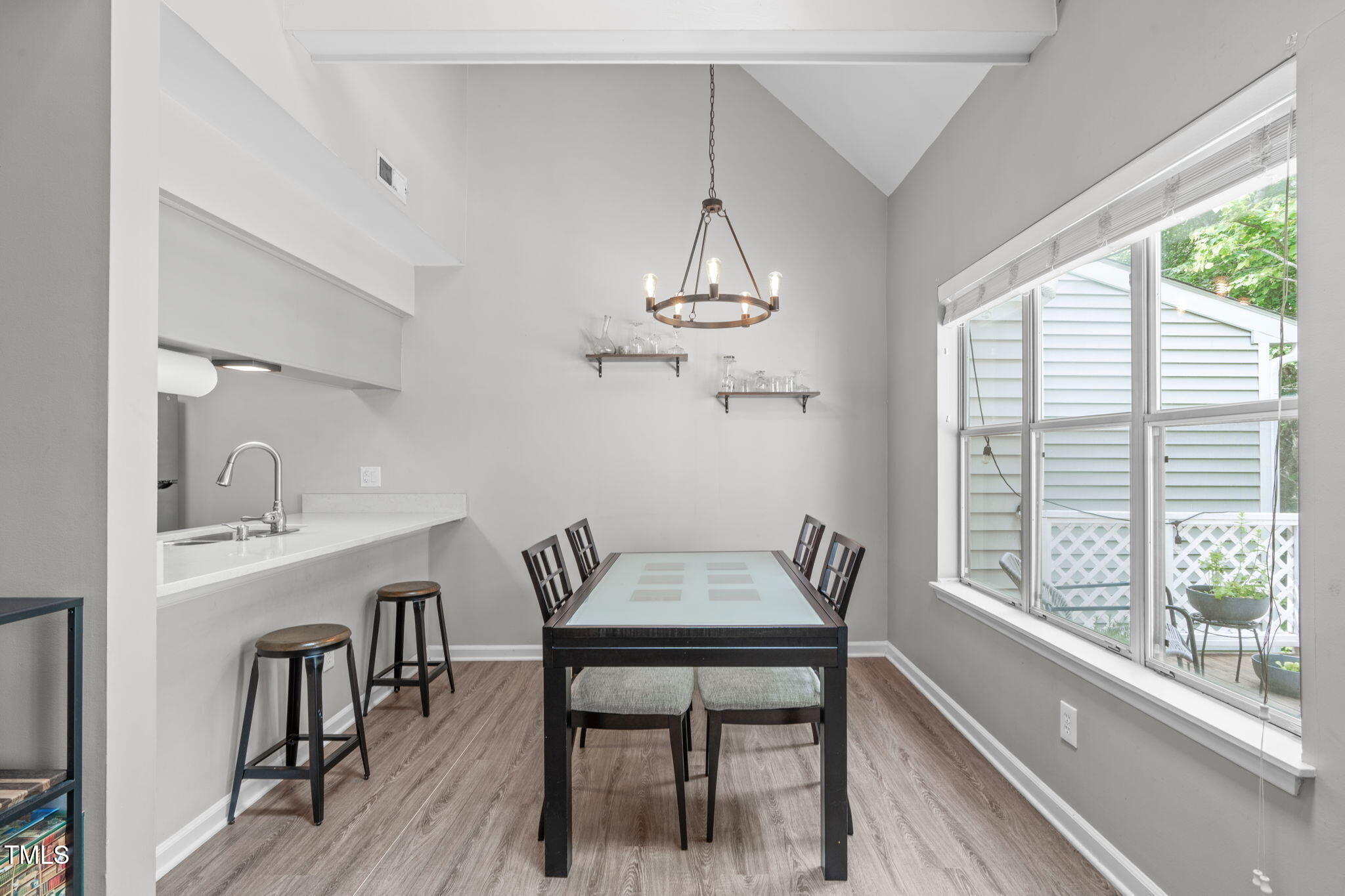 405 Gooseneck Drive, Unit B6 Cary, NC 27513 - Photo 9 of 26 a view of a dining room with furniture window and outside view