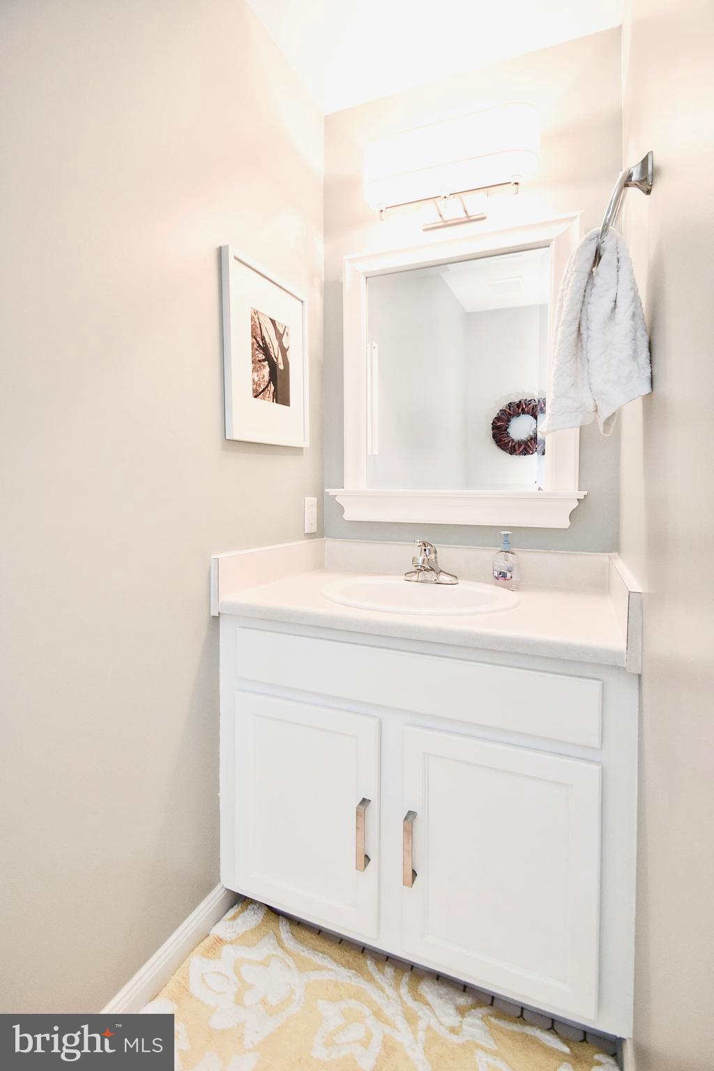 102 Peregrine Lane Hummelstown, PA 17036 - Photo 12 of 28 a bathroom with a sink and a mirror