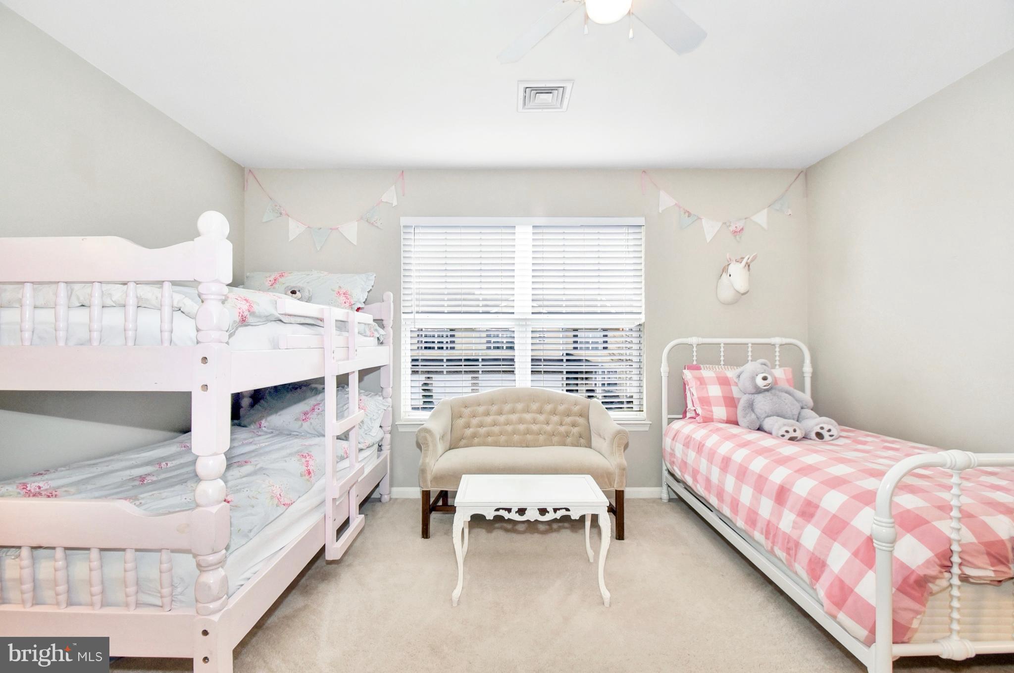 102 Peregrine Lane Hummelstown, PA 17036 - Photo 22 of 28 a bedroom with a bed and a couch