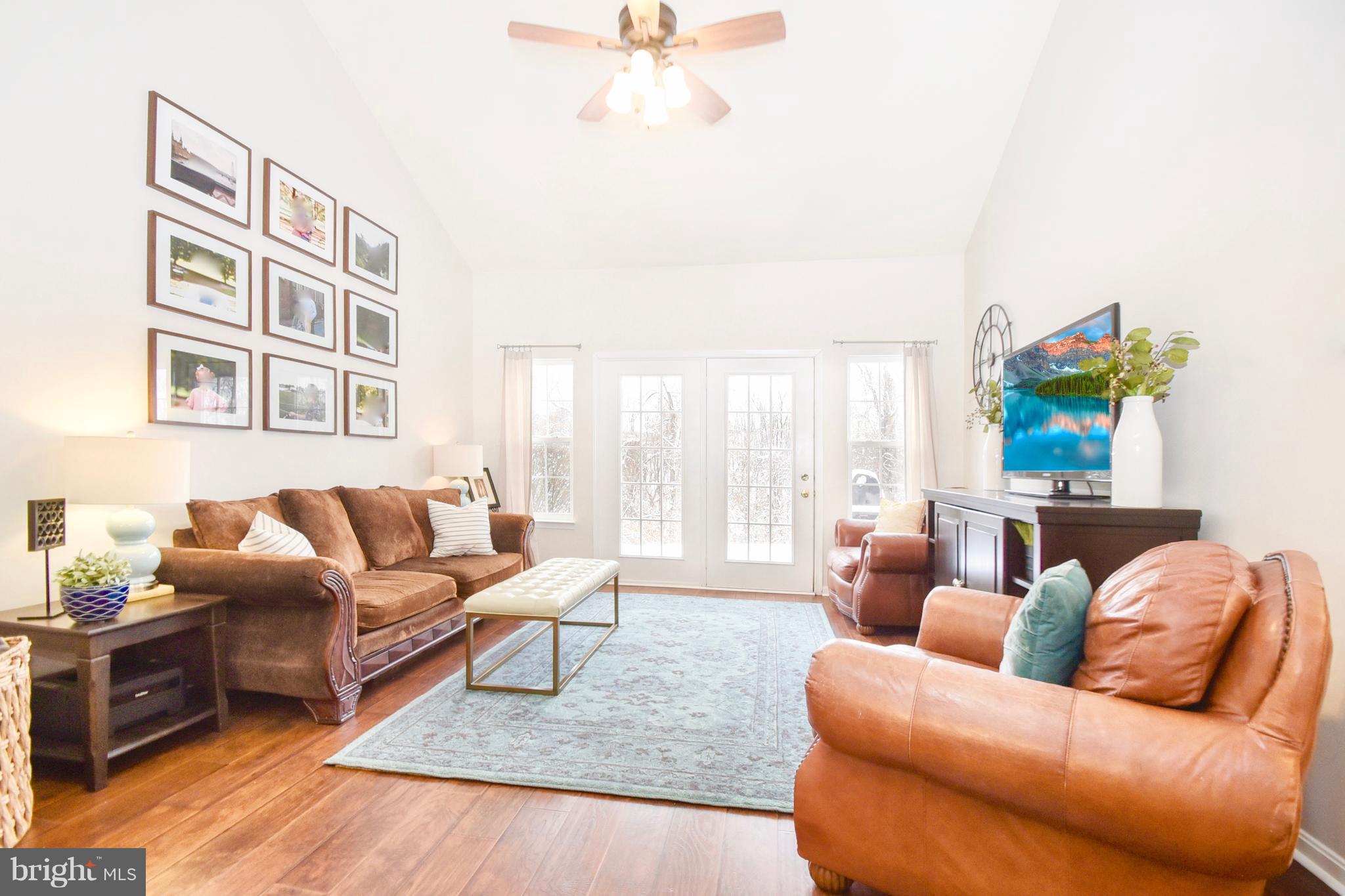 102 Peregrine Lane Hummelstown, PA 17036 - Photo 3 of 28 a living room with furniture and a potted plant