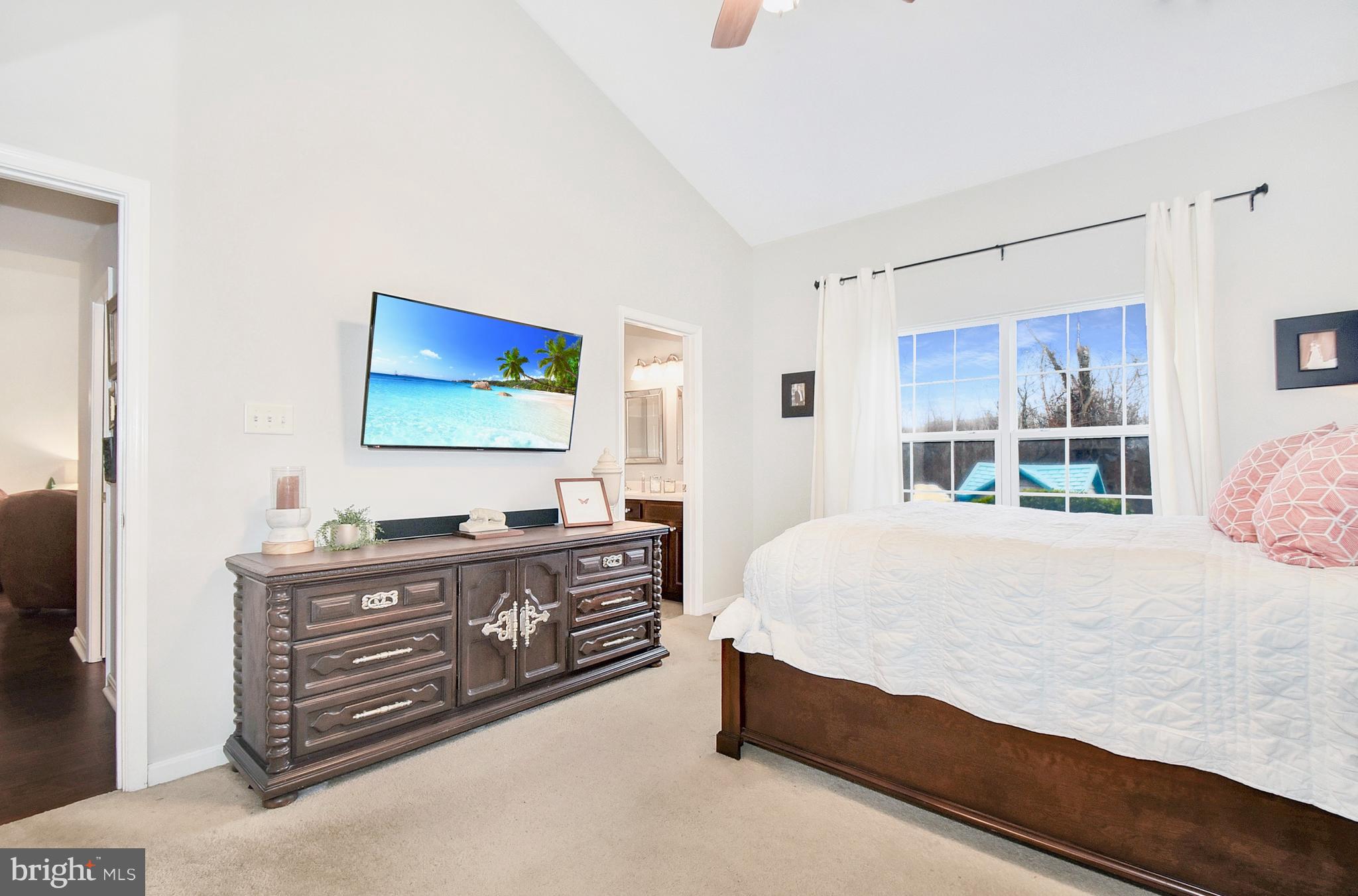 102 Peregrine Lane Hummelstown, PA 17036 - Photo 10 of 28 a bedroom with a bed and a flat screen tv