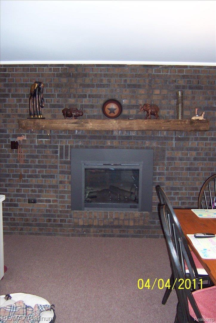 4333 7 Mile Road South Lyon, MI 48178 - Photo 4 of 9 Country Kitchen w/ Elec Fireplac