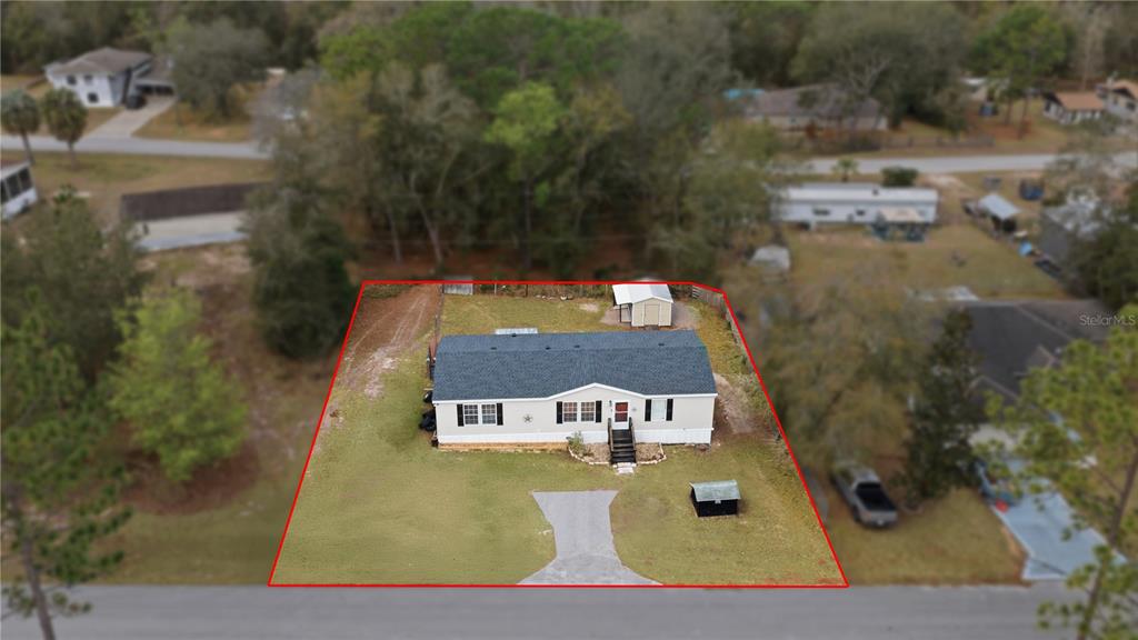 12400 Southeast 99th Terrace Belleview, FL 34420 - Photo 3 of 20 view of pool with table and chairs