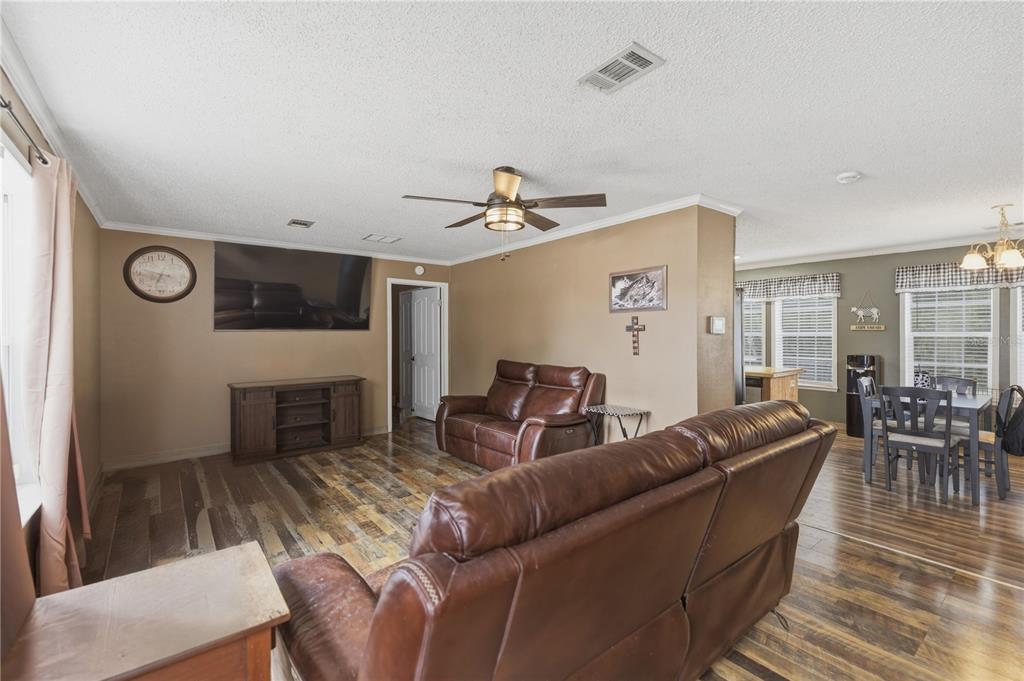 12400 Southeast 99th Terrace Belleview, FL 34420 - Photo 8 of 20 a living room with furniture and a table