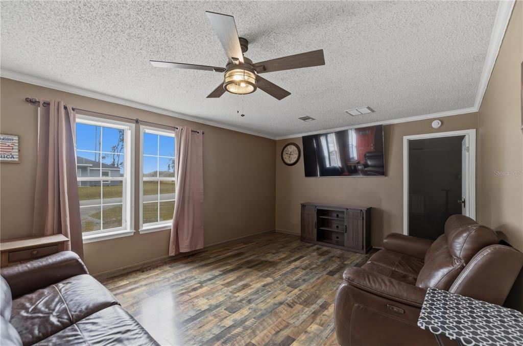 12400 Southeast 99th Terrace Belleview, FL 34420 - Photo 9 of 20 a bedroom with furniture and a window