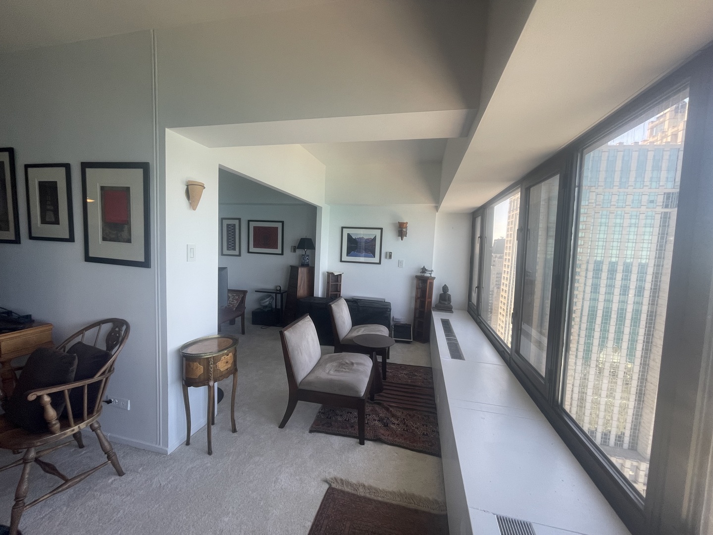 175 East Delaware Place, Unit 5403 Chicago, IL 60611 - Photo 11 of 20 a living room with furniture and a window