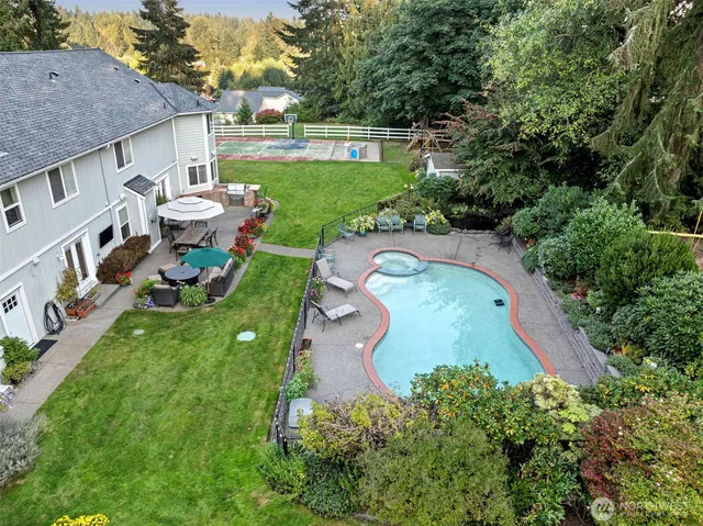 an aerial view of a house with garden
