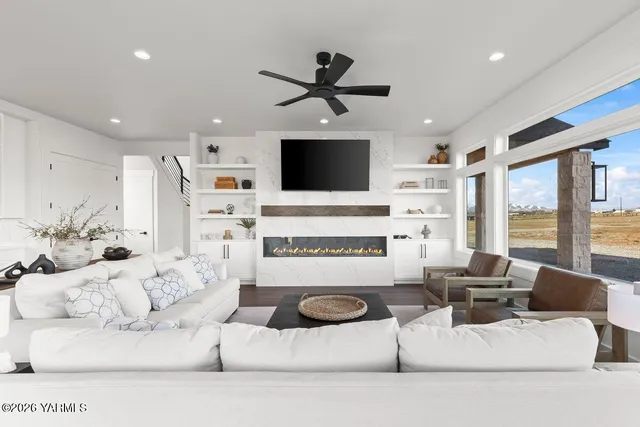 a kitchen with stainless steel appliances kitchen island a large island in the center