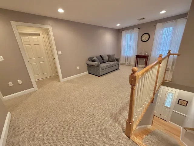 a view of a livingroom with furniture and wooden floor