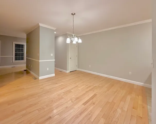 a bathroom with a sink toilet and a mirror
