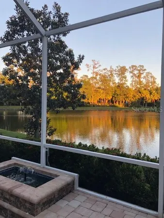 a view of swimming pool from a balcony