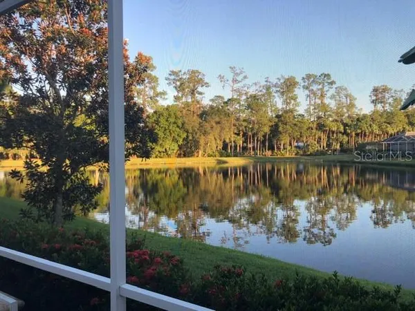 a view of a lake from a balcony