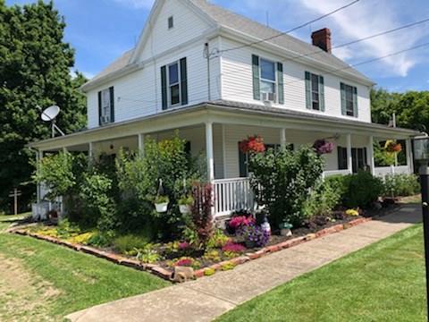 235 Sanitarium Road Washington, PA 15301 - Photo 2 of 25 Beautiful mature landscaping surrounds the wrap-around porch.