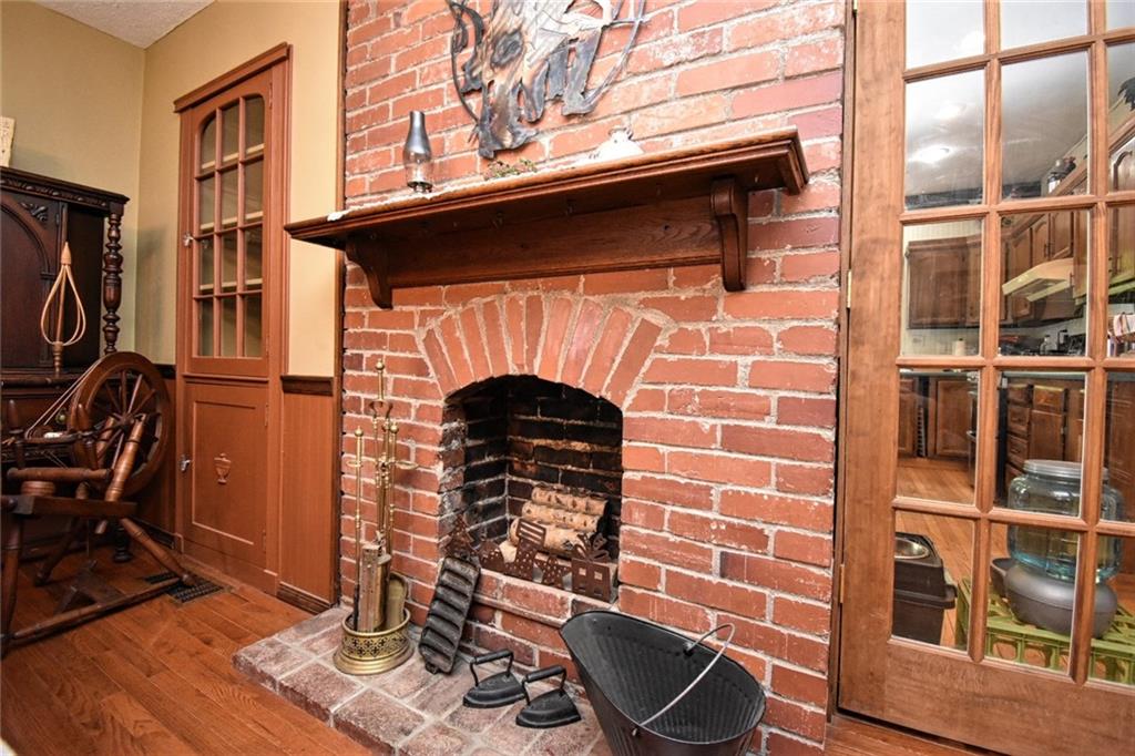 235 Sanitarium Road Washington, PA 15301 - Photo 12 of 25 One of the original bricked fireplaces that is located in the Dining Room.