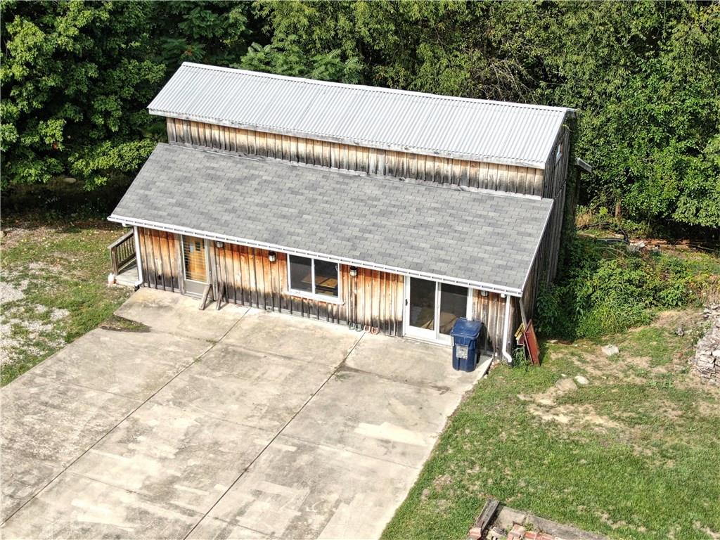 235 Sanitarium Road Washington, PA 15301 - Photo 3 of 25 The large Barn offers a 2-story BONUS space that has been tastefully finished as additional entertaining space, complete with a bar area.