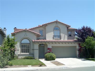 10 Wild Rye Way Napa, CA 94558 - Photo 1 of 8 a front view of a house with garden