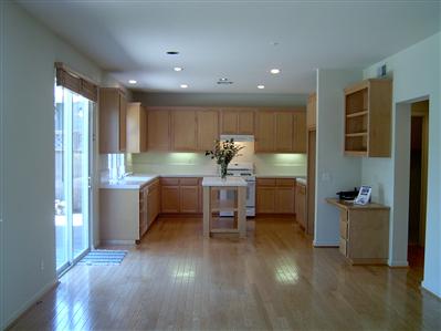 10 Wild Rye Way Napa, CA 94558 - Photo 4 of 8 a kitchen with sink refrigerator and cabinets