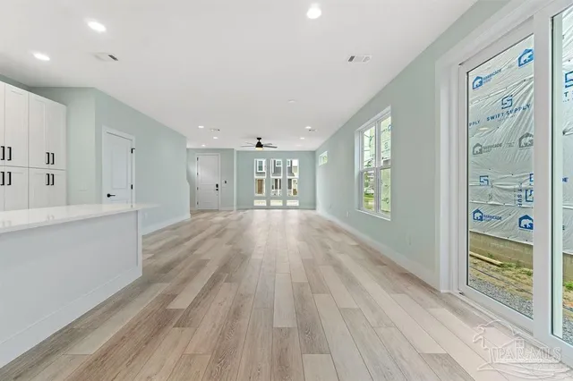 a view of an empty room and window