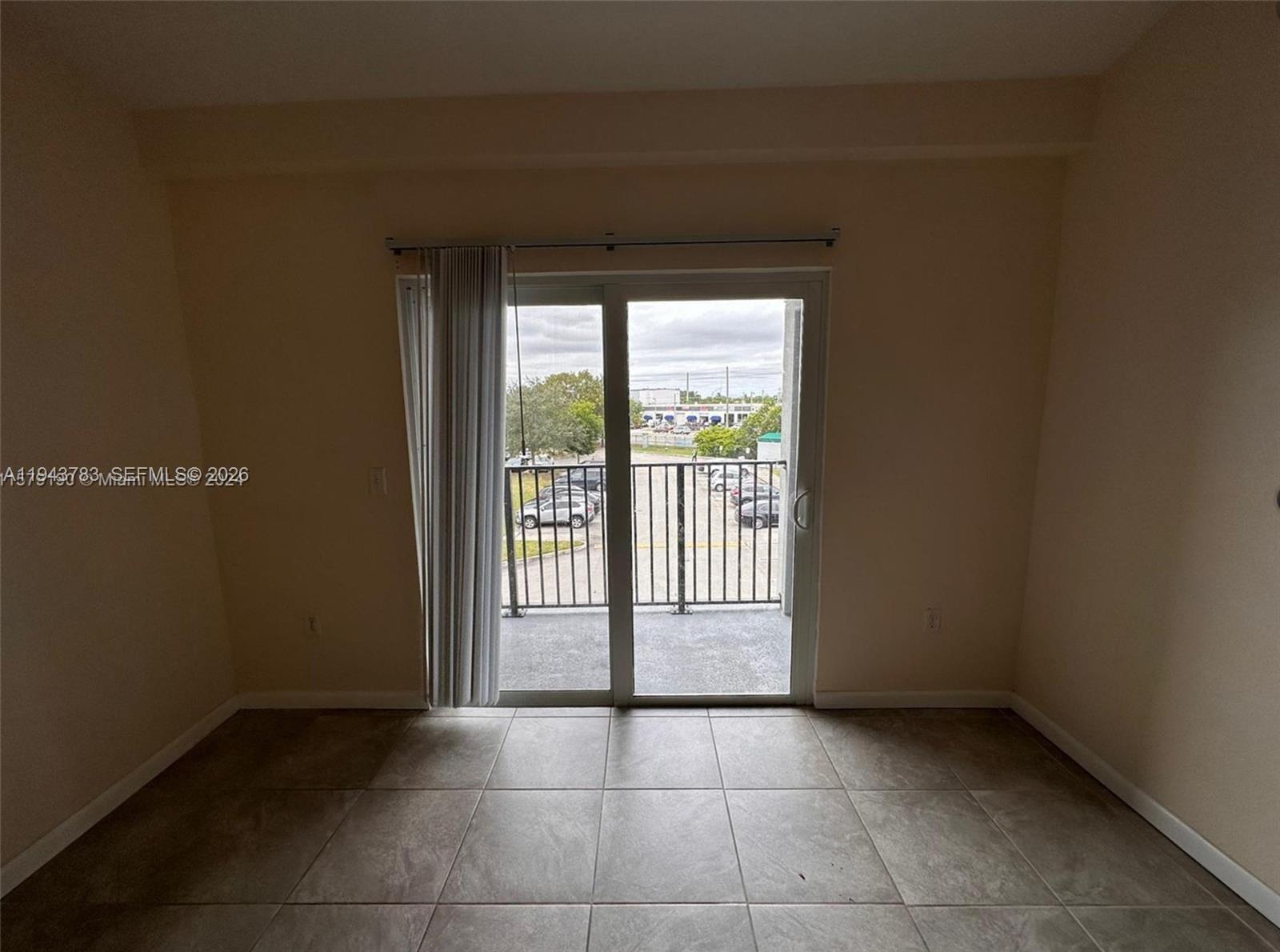 15480 Southwest 284th Street, Unit 2304 Homestead, FL 33033 - Photo 14 of 31 a view of an empty room and window