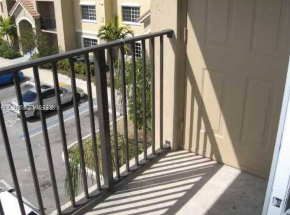 15480 Southwest 284th Street, Unit 2304 Homestead, FL 33033 - Photo 15 of 31 a view of a balcony with stairs